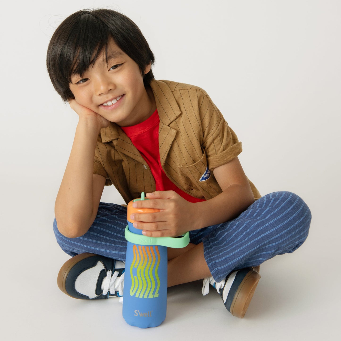 traveler-with-flip-straw-lid-16oz-w0 Swell-Kids-Water-Bottle-Traveler-16oz-Blue-Chill-Lifestyle.jpg